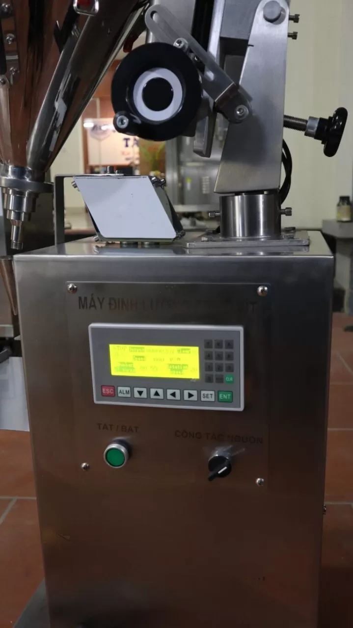Máy định lượng trục vít từ 2 tới 20gram (mức định lượng theo yêu cầu không quá 100gram)  HADG-DL01