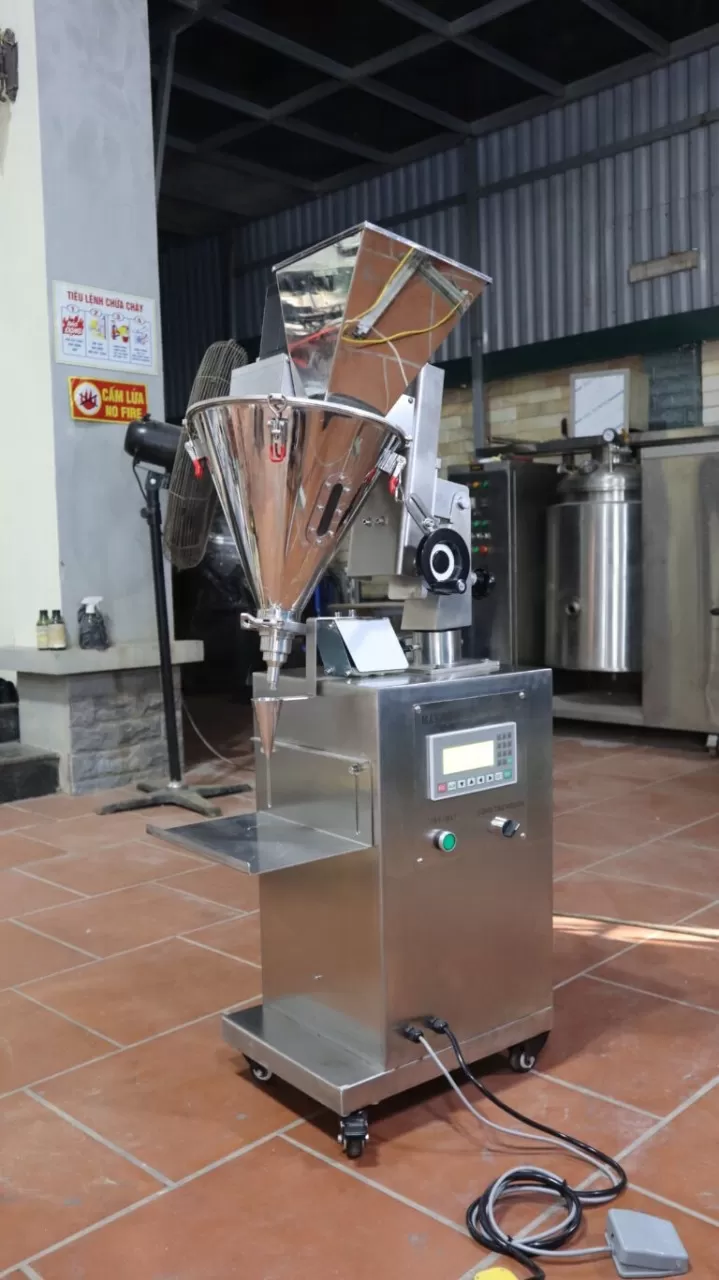 Máy định lượng trục vít từ 2 tới 20gram (mức định lượng theo yêu cầu không quá 100gram)  HADG-DL01