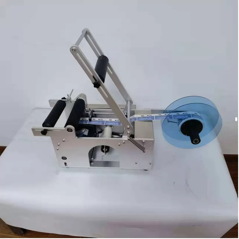 Máy dán nhãn decan chai tròn bán tự động HAĐG-2T4