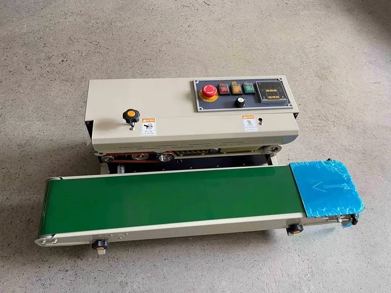 Máy hàn miệng túi liên tục FR-900L (Đường hàn dịch chuyển cách miệng túi 160mm) HADG-HLA14