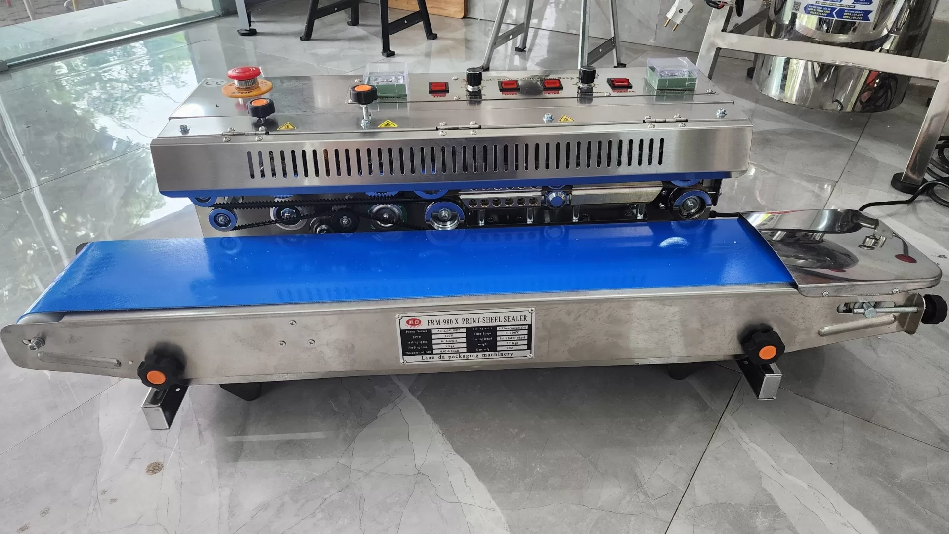 Máy hàn miệng túi liên tục SFR-980 có indate HADG-HLA10