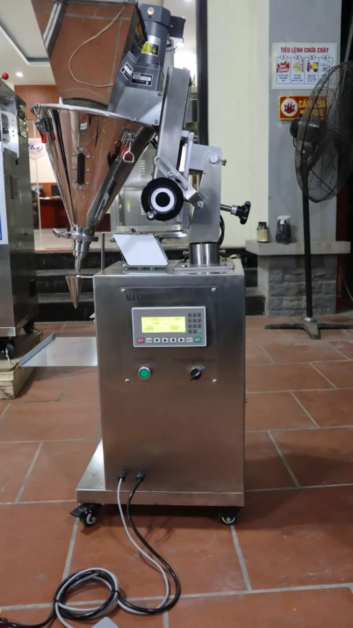 Máy định lượng trục vít từ 2 tới 20gram (mức định lượng theo yêu cầu không quá 100gram)  HADG-DL01