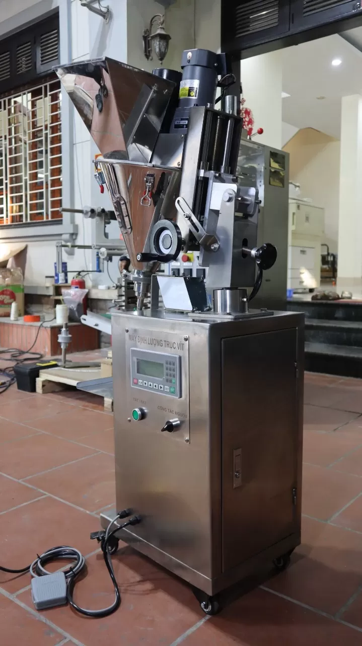 Máy định lượng trục vít từ 2 tới 20gram (mức định lượng theo yêu cầu không quá 100gram)  HADG-DL01