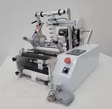 Máy dán nhãn chai tròn bán tự động có indate HADG-2T1