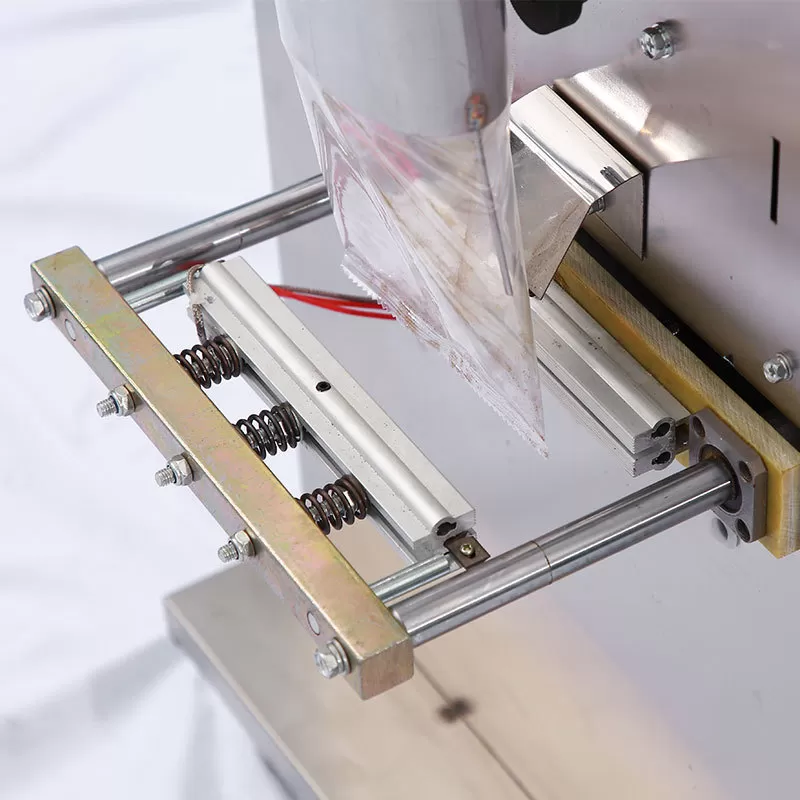 Máy đóng gói cân điện tử hỗn hợp 2 đầu cân 1-99gram ( hàn 3 biên theo yêu cầu) HADG-DD14-2